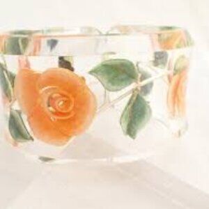 José Cotel reverse carved lucite bangle